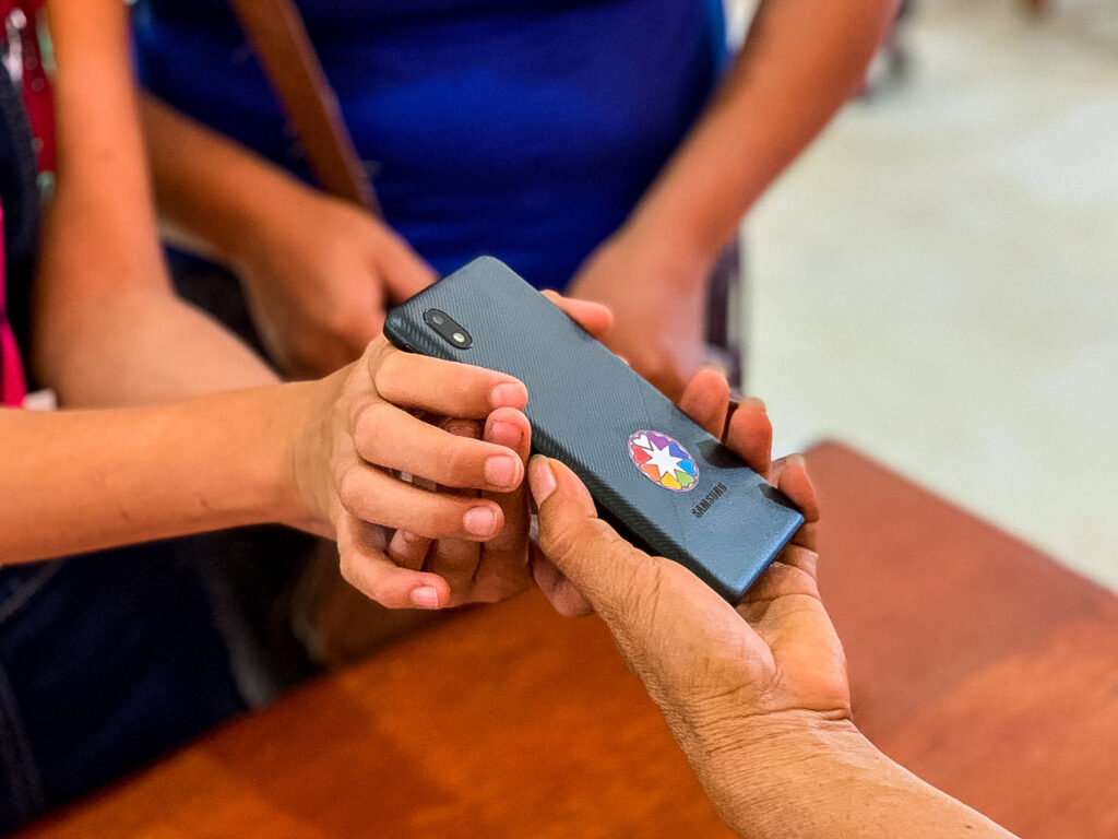 Handing out phones so students in Pucallpa Peru can attend online school.
